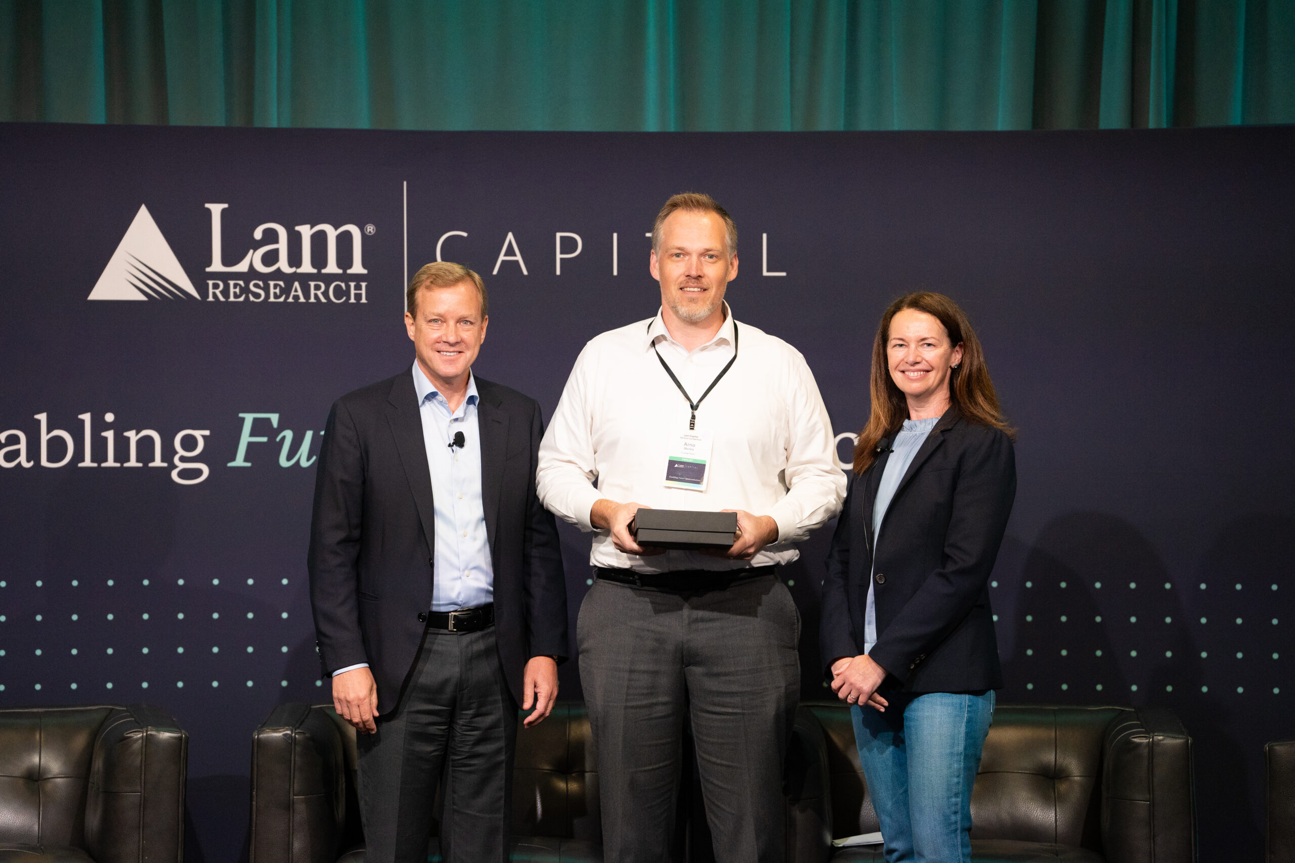 From left to right： Tim Archer, President & CEO, Lam Research | 
Arno Merkle, Cofounder & CEO, Crystal Sonic (2024 Venture Competition Winner) | 
Audrey Charles, SVP of Corporate Strategy and Advanced Packaging, Lam Research